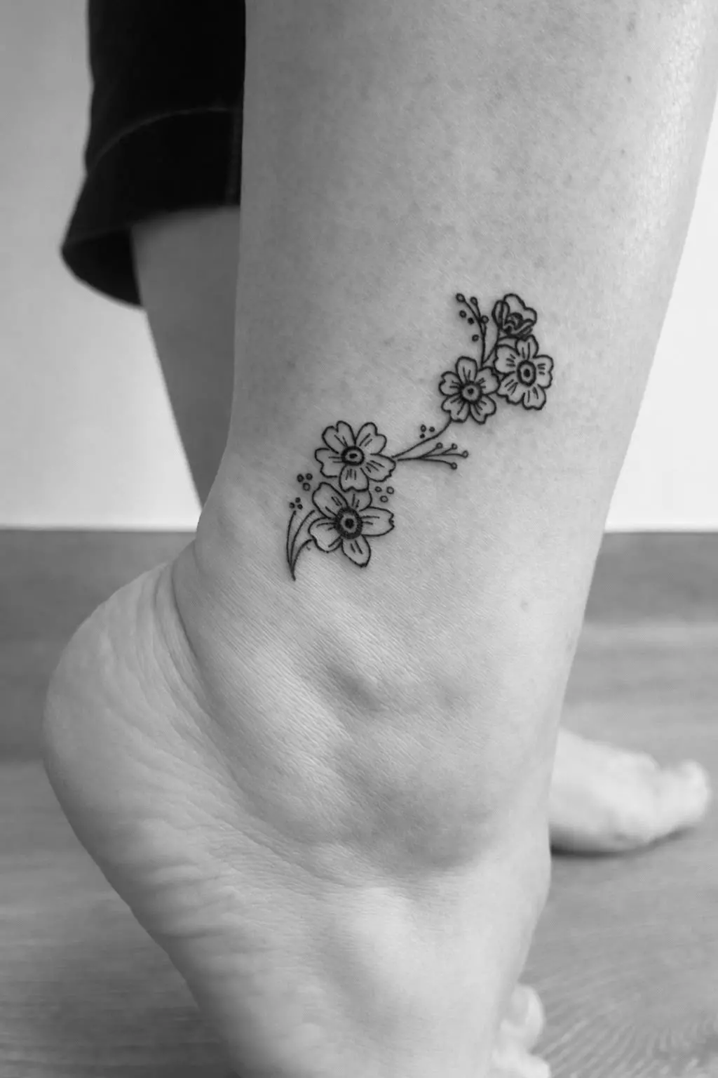 Tiny Tattoo sur le pied